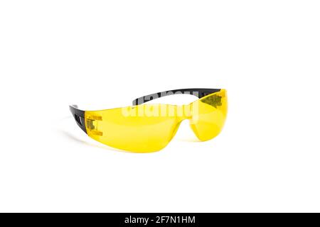 Yellow protection glasses isolated on white background close up Stock Photo