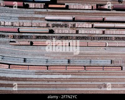 Aerial view from flying drone of trains on the railway station Stock Photo