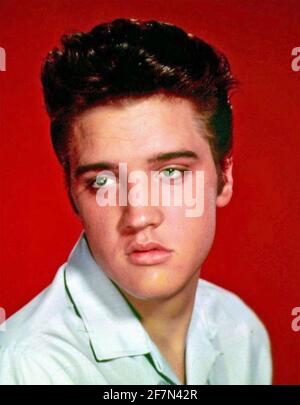 ELVIS PRESLEY (1935-1977) American singer, musician and film actor about 1956 Stock Photo