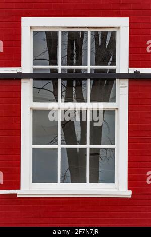 Window details of the Glen Haven Canning Co. building, now the Great Lakes Boathouse Museum, in historic Glen Haven Village in Sleeping Bear Dunes Nat Stock Photo