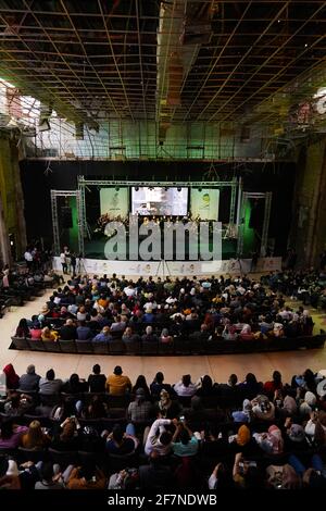 The audience during a performance by the Watar orchestral, playing for the first time on the grounds of the Spring Theatre Hall, which was destroyed during the ISIS occupation in the city.The Watar orchestral includes 36 young men and women from different denominations of Nineveh Governorate, including Muslims, Christians and Yazidis, whose ages range between 8-32 years. Stock Photo