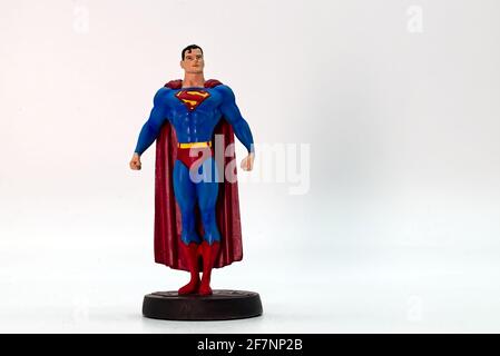 Superman action figure isolated on white background. Superheroes Comic books by DC. Empty space for text.