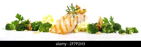 Grilled Salmon Steak with Broccoli, mashed Potatoes and Cheese Cracker - Panorama isolated on white Background Stock Photo