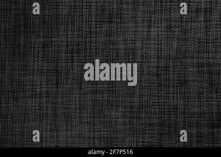 Textured gray black surface of woven plastic material. Abstract dark background Stock Photo