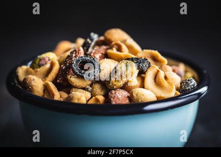 Mix of salted nuts in bowl. Stock Photo