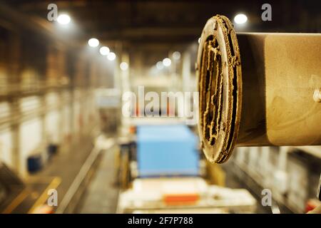 railing of the factory shop. fences for the safety of employees at work. industrial landscape of the factory interior Stock Photo