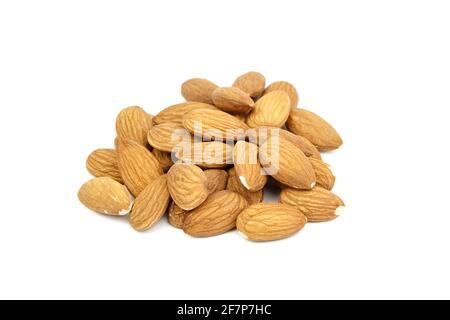 Almond nuts isolated on white background. Heap of peeled almonds Stock Photo