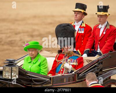 11 June 2016. HM Queen Elizabeth II attends 2016 Trooping the Colour ceremony at Horse Guards Parade in London, UK on her 90th birthday with Prince Philip, Duke of Edinburgh, alongside in the open carriage. The Duke of Edinburgh wears uniform of Colonel in Chief, Grenadier Guards. Credit: Malcolm Park/Alamy Live News. Stock Photo