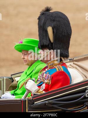 11 June 2016. HM Queen Elizabeth II attends 2016 Trooping the Colour ceremony at Horse Guards Parade in London, UK on her 90th birthday with Prince Philip, Duke of Edinburgh, alongside in the open carriage. The Duke of Edinburgh wears uniform of Colonel in Chief, Grenadier Guards. Credit: Malcolm Park/Alamy Live News. Stock Photo