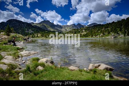 Estany Primer de Pessons lake in a summer morning (Andorra, Pyrenees) ESP: Estany Primer de Pessons, una mañana de verano (Andorra, Pirineos) Stock Photo