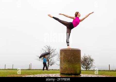Waseley Hills, Rubery, Birmingham, UK. 9th Apr, 2021. Dance student Amelia Hubbard, 16, practices her dance skills at Waseley Hills park near her home in Birmingham, on a dull damp morning. Amelia is looking forward to her dance academy reopening next week as lockdown restrictions are eased further. Credit: Peter Lopeman/Alamy Live News Stock Photo