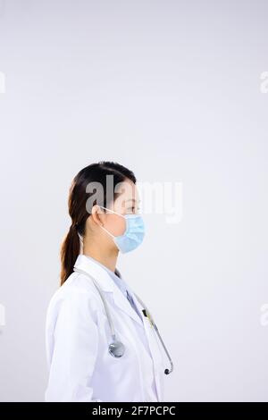 A woman doctor was wearing a mask side view Stock Photo