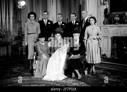 File photo dated 15/12/48 of Queen Elizabeth II holding her son, the Prince Charles after his christening in Buckingham Palace. With her seated to the left is Dowager Marchioness of Milford Haven, and right is the Prince's Great Grandmother Queen Mary. Godparents standing from left to right; Lady Brabourne, the Duke of Edinburgh (standing proxy for Prince George of Greece), King George VI, David Bowes-Lyon, the Earl of Athlone (who stood proxy for the King of Norway) and Princess Margaret. The Duke of Edinburgh has died, Buckingham Palace has announced. Issue date: Friday April 9, 2020.. See P Stock Photo