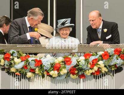 File photo dated 01/06/13 of Queen Elizabeth II and the Duke of Edinburgh during the Investec Derby Day at Epsom Downs Racecourse in Surrey. The Duke of Edinburgh has died, Buckingham Palace has announced. Issue date: Friday April 9, 2020.. See PA story DEATH Philip. Photo credit should read: Dominic Lipinski/PA Wire Stock Photo