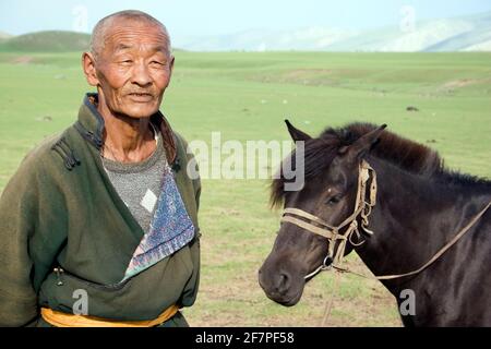 A man and his horse, Nadaam, Mongolia Stock Photo