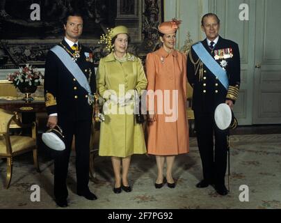 FILE 1983-05-25. Queen Elizabeth II and Prince Philip of England posing with their royal Swedish host couple King Carl Gustaf och Queen Silvia at the Royal Palace in Stockholm, after arrival in Stockholm, Sweden on May 25, 1983. The British royal couple is in Sweden on a four-day official state visit May 25 to 28. Photo: Jan Collsioo / TT / Code: 1001 Stock Photo