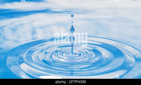beautiful abstract background with water drops water drops splash circles on the water surface Stock Photo