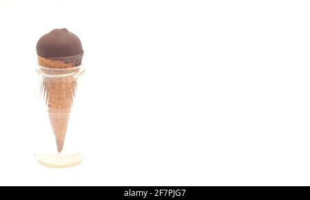 https://l450v.alamy.com/450v/2f7pjg7/chocolate-ice-cream-cone-in-small-glass-bottle-on-white-background-copyspace-2f7pjg7.jpg