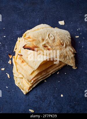 Pane Carasau bread, also called Carta da Musica bread (sheet music), traditional crispy flatbread of Sardinia, Italy. Stock Photo