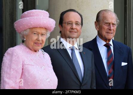 Buckingham Palace has announced Prince Philip, The Duke of Edinburgh, has passed away age 99 - FILE - Queen Elizabeth II, Duke of Edinburgh and French President Francois Hollande arrives at the Elysee palace in Paris, France, June 5, 2014. The Queen is on a 2-day state visit ahead of the ceremonies marking the D-Day 70th Anniversary in Normandy. Photo by Christian Liewig/ABACAPRESS./Alamy Live News