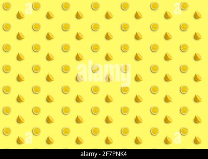 Fresh lemon pattern on a flat bright color background Stock Photo