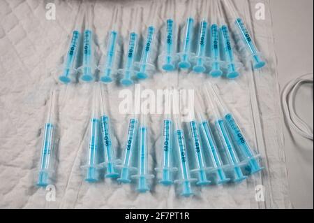 Madrid, Spain. 09th Apr, 2021. Syringes ready to be used with AstraZeneca vaccine against coronavirus (COVID-19) during the first day of a mass vaccination for the population between 60 and 65 years in the Wizink Center. Credit: Marcos del Mazo/Alamy Live News Stock Photo