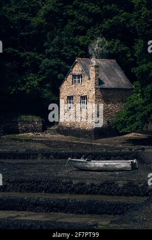 Boat House on the Belon River at Port du Bélon, famous for its Oyster Beds. Finistere, Bretagne, Brittany, France, Europe Stock Photo