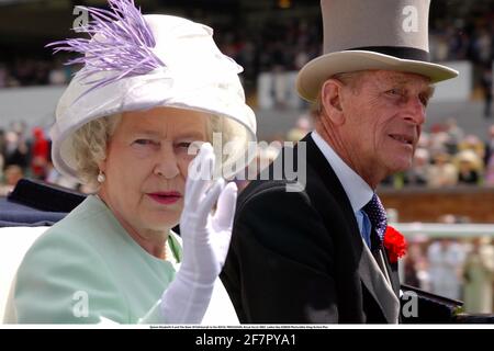 FILE PHOTO: Queen Elizabeth II and The Duke Of Edinburgh in the ROYAL PROCESSION, Royal Ascot 2002. Ladies Day 020620 Photo:Mike King/Action Plus.Horse Racing.royals royalty Credit: Action Plus Sports Images/Alamy Live News Stock Photo