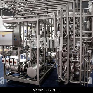 Tubular Aseptic UHT Pasteurizer with Vacuum Deaerator. Food industry Stock Photo