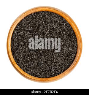 Black amaranth grain in a wooden bowl. Seeds of Amaranthus, a pseudocereal, staple food and source of protein of the Aztecs, banned by conquistadors. Stock Photo