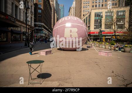 A giant basketball as a brand activation for Boss Athletic in front of Macy’s Herald Square in New York on Sunday, April 4, 2021. (© Richard B. Levine) Stock Photo