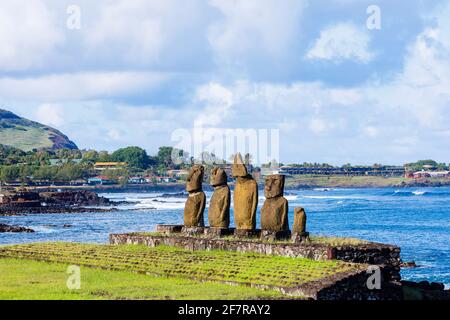 Ahu Vai Ure moai (statues) with their backs to the Pacific Ocean coast at Tahai, Hanga Roa, Easter Island (Rapa Nui), Chile Stock Photo