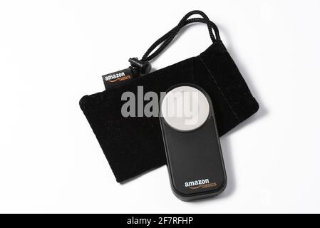 Timisoara, Romania- 23 March 2021: Amazon remote control for DSLR camera, with black fabric bag, on white background. Stock Photo