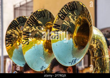 Three trombones of the marching band during a popular festival. Cocullo, province of l'Aquila, Abruzzo, Italy, Europe Stock Photo