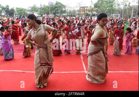 Assam, India. 9th Apr 2021. Woman and girls dancing as they are participated in a Bihu folk dance workshop ahead of Rongali Bihu Festival on April 09, 2021 in Guwahati, Assam, India. Bihu dance is an indigenous folk dance from the Indian state of Assam related to the Bihu festival and an important part of Assamese culture. Credit: David Talukdar/Alamy Live News Stock Photo