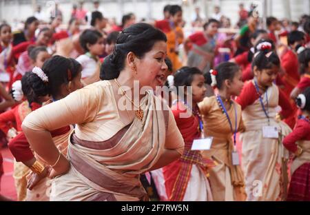 Assam, India. 9th Apr 2021. Woman and girls dancing as they are participated in a Bihu folk dance workshop ahead of Rongali Bihu Festival on April 09, 2021 in Guwahati, Assam, India. Bihu dance is an indigenous folk dance from the Indian state of Assam related to the Bihu festival and an important part of Assamese culture. Credit: David Talukdar/Alamy Live News Stock Photo