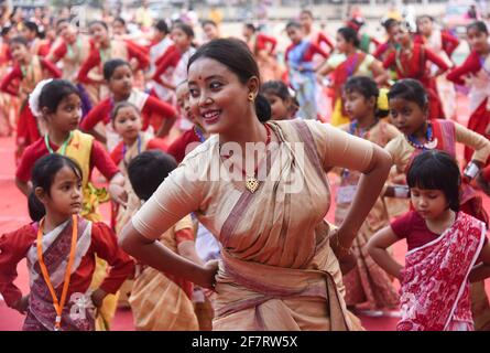 Assam, India. 9th Apr 2021. Woman and girls dancing as they are participated in a Bihu folk dance workshop ahead of Rongali Bihu Festival on April 09, 2021 in Guwahati, Assam, India. Bihu dance is an indigenous folk dance from the Indian state of Assam related to the Bihu festival and an important part of Assamese culture. Credit: David Talukdar/Alamy Live News Stock Photo