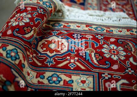 Beautiful oriental patterns and ornaments on a Persian rug in Iran Stock Photo