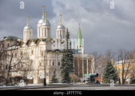 Twelve Apostles' Cathedral and Tsar Cannon in Winter in Moscow Kremlin, Russia Stock Photo