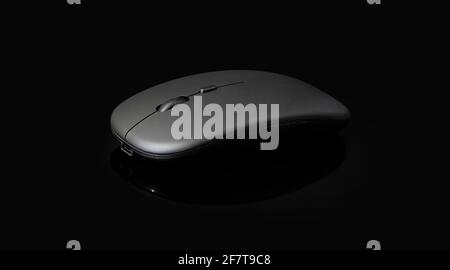 wireless black mouse isolated on black background with clipping path Stock Photo