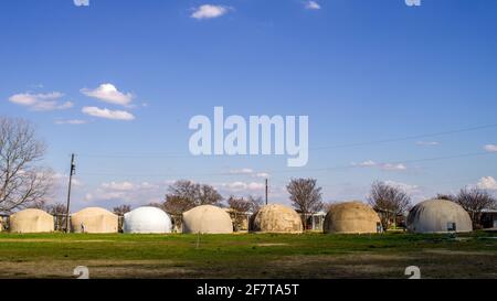 Series of dome style homes located at the Monolithic Dome Institute in Italy, Texas Stock Photo