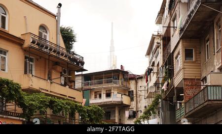 Old multi-storey buildings in Georgia. Traditional houses of Batumi, old street. Stock Photo