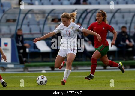 Lisbon, Portugal. 9th Apr, 2021. Marina Fedorova of Russia (L) in action during the UEFA Women's EURO 2022 play-off first leg match between Portugal and Russia, at the Restelo stadium in Lisbon, Portugal, on April 9, 2021. Credit: Pedro Fiuza/ZUMA Wire/Alamy Live News Stock Photo