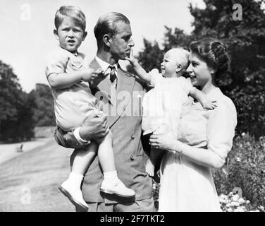 August 1951, London, England, United Kingdom: PRINCESS ELIZABETH, right, in the garden of Clarence House with her husband PRINCE PHILIP and their children PRINCE CHARLES and the Baby PRINCESS ANNE. (Credit Image: © Keystone Press Agency/Keystone USA via ZUMAPRESS.com) Stock Photo