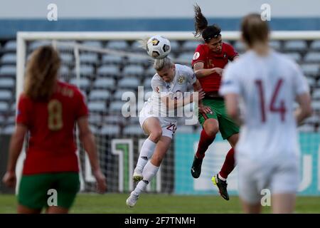 Lisbon, Portugal. 9th Apr, 2021. Nelli Korovkina (L) of Russia vies with Carole Costa of Portugal during the UEFA Women's EURO 2022 play-off first leg football match between Portugal and Russia in Lisbon, Portugal, on April 9, 2021. Credit: Pedro Fiuza/Xinhua/Alamy Live News Stock Photo