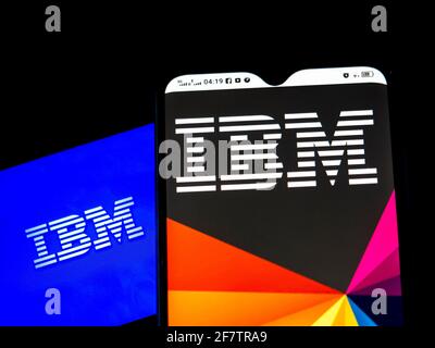 In this photo illustration IBM Corp. logo seen displayed on a smartphones Stock Photo