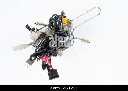 technological waste that remains in residence as computer cables Stock Photo