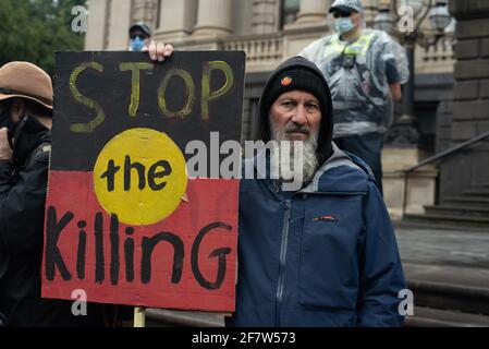Melbourne, Australia. 10th April 2021. 'Stop the Killing'. Protesters gather outside Parliament as part of a national day of action to stop black deaths at the hands of police, 30 years after a royal commission into police brutality against indigenous people and yet nothing has changed. This follows the most recently documented case of police brutality towards an Aboriginal teenager in New South Wales earlier this month. Credit: Jay Kogler/Alamy Live News Stock Photo