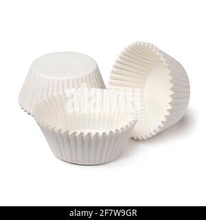 White empty paper cupcake or muffin cups isolated on white background Stock Photo