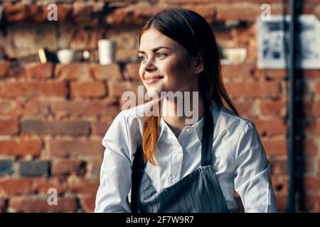 woman waiter coffee cup service restaurant lifestyle Stock Photo